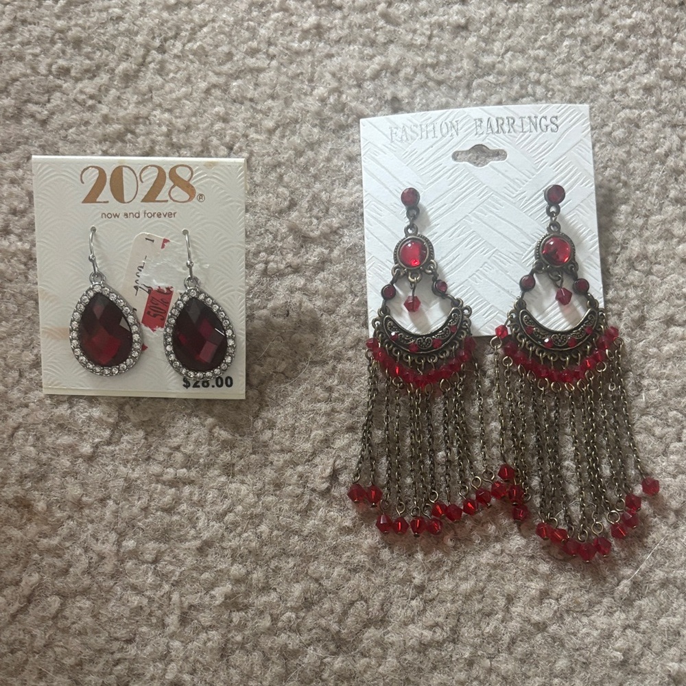 Fancy costume RED earrings 
Never worn /sill in packaging